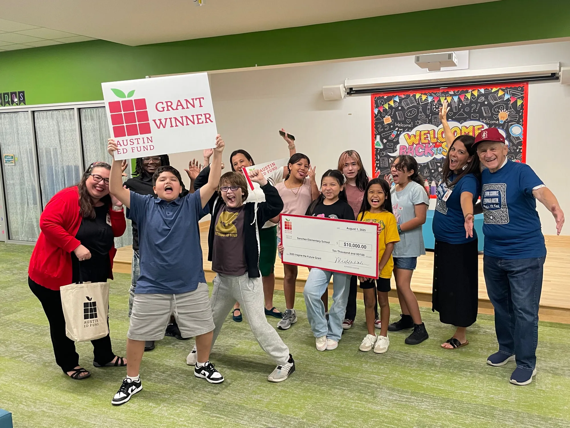 Sanchez Elementary staff and students celebrating their Inspire the Future grant award